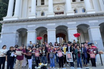 With roses and bread, immigrants call on Gov. Newsom to sign pro-immigrant bills